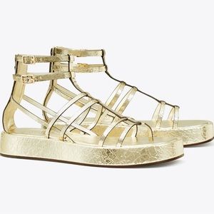 Tory Burch Capri metallic platform gladiator sandal
Size: 5.5 
Color: Platino